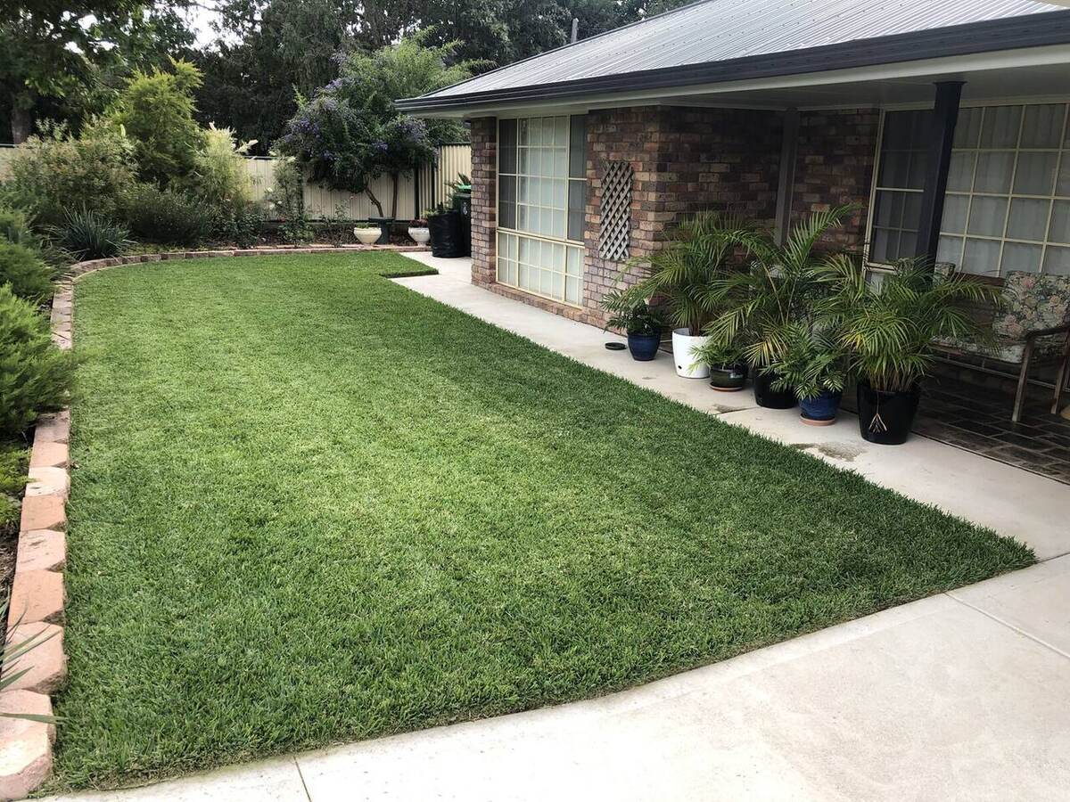 Neatly mown residential lawn completed by P&Z